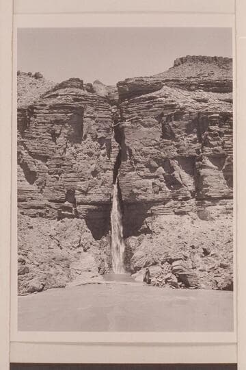 Deer Creek Falls. The clear water of the lagoon is held by a low sand bar