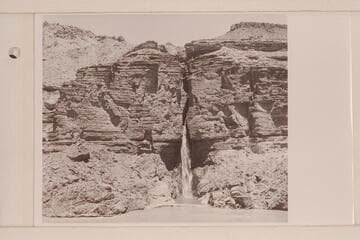Deer Creek Falls. The clear lagoon is held in by a low sand bar