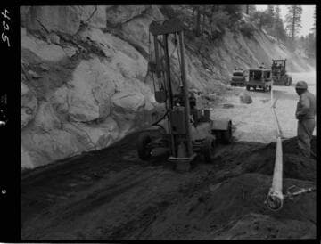 Big Creek - Mammoth Pool - Demonstrating hand operated compacting tools
