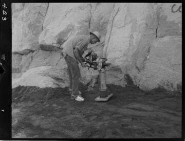 Big Creek - Mammoth Pool - Demonstrating hand operated compacting tools