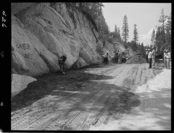 Big Creek - Mammoth Pool - Demonstrating hand operated compacting tools