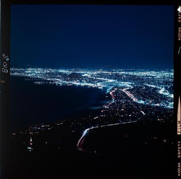 Cityscape at night showing streetlights of West Los Angeles. Looking north to Santa Monica from Palos Verdes Peninsula
