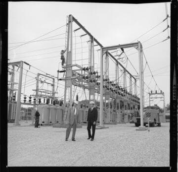 Men in front of Lomita City Hall