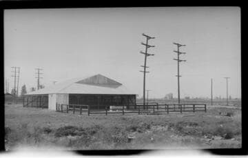 Barn with attached coral for livestock