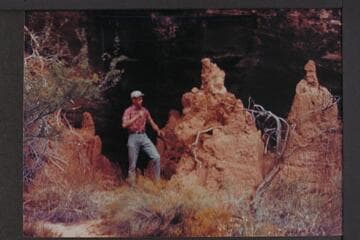 Allyn Cureton at clay in front of seep spring one mile below mouth of Havatagvitch Canyon; Supai