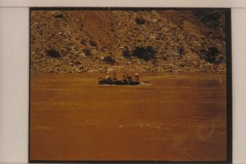 The Spencer party near Diamond Creek. The operation is following the Moki Mac technique with inflated boat and paddles