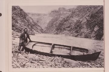 Charles Russell sitting on the "Utah." In the Archean section probably below the end of the trail at Pipe Creek