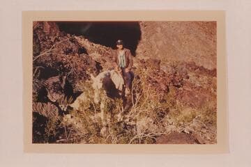 Jimmy Jordan on an unfamiliar craft. Riding up the Whitmore Trail on "Pete." During the work of the Arizona Power Authority in studying dam sites