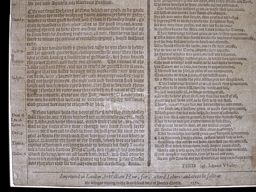 A close-up image of a 16th-century broadside, showing two columns of writing.