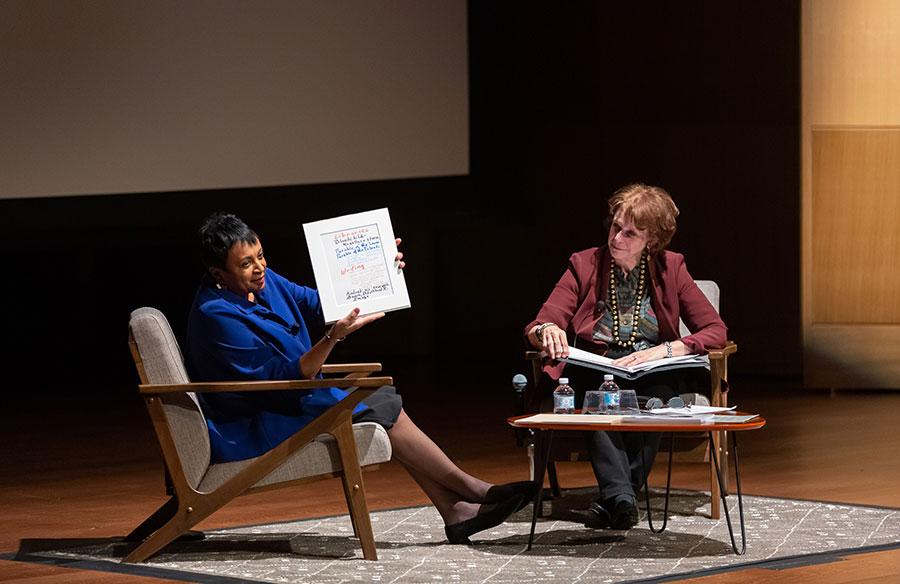 Carla Hayden holds a copy of Octavia Butler's notes