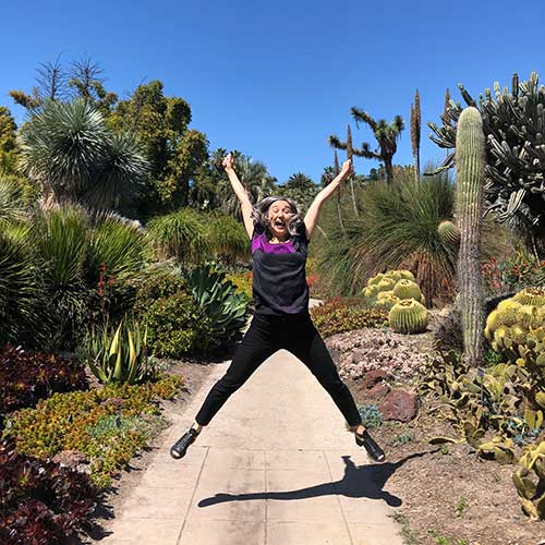 Photo of jumping girl in Desert Garden