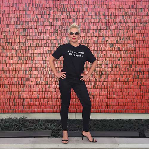 Posing in front of Doyle Lane mural