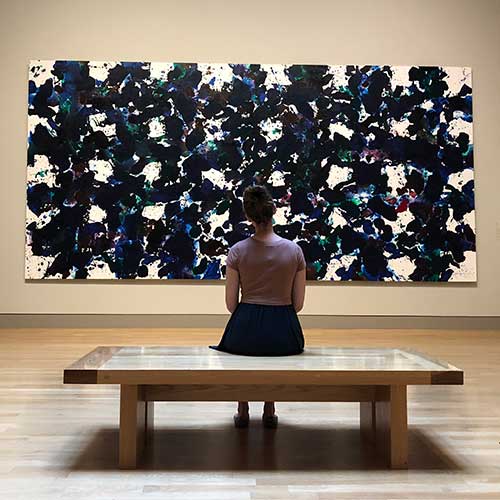 Sitting in front of Free Floating Clouds by Sam Francis