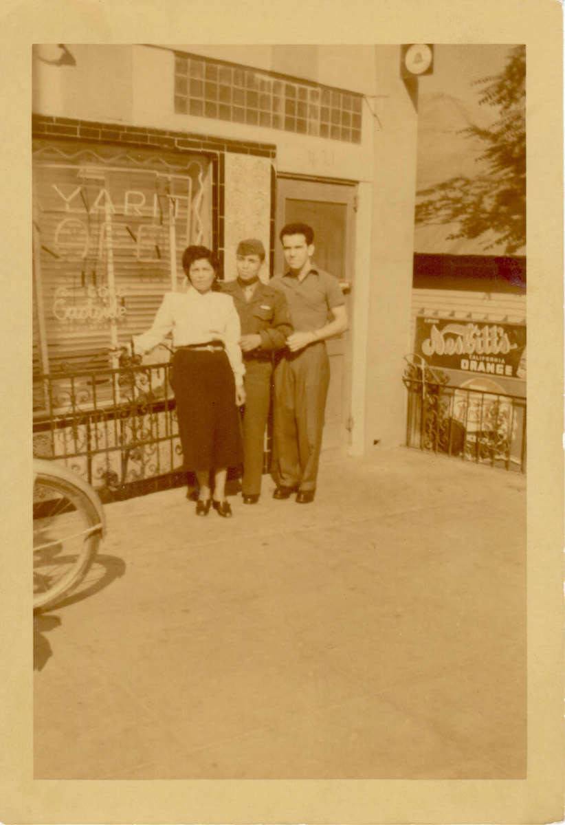 Facade of the original Nayarit restaurant, which closed around 1953. Left to right: Doña Natalia’s friend Cecilia Torres; Carlos Peres (Doña Natalia’s son); Ramón Barragan. Photograph provided by María Perea Molina. 
