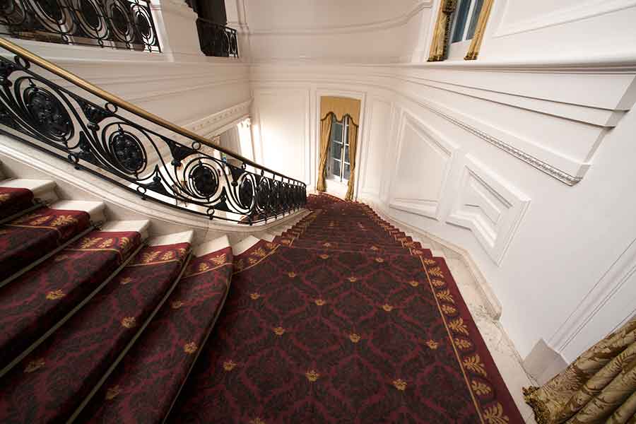 The new carpet on the Huntington Art Gallery’s grand double staircase
