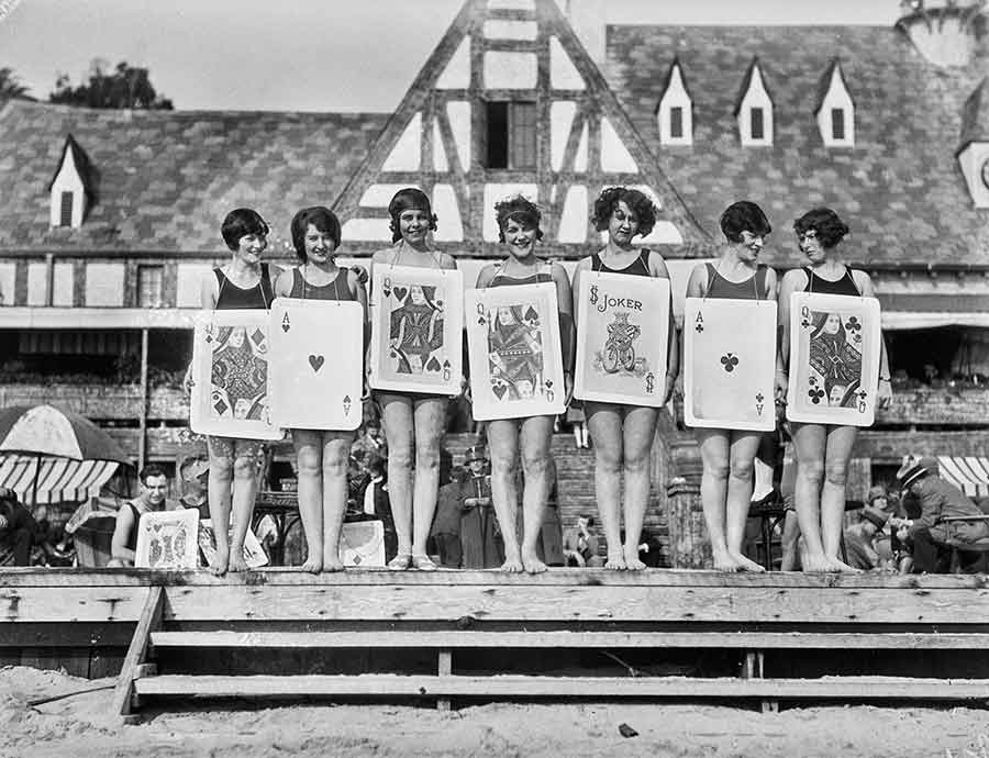 Human card game at Gables Beach Club, Santa Monica, late 1920s; photograph by Powell Press Service.