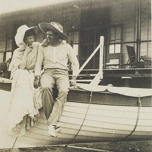 Jack and Charmain London sitting on a sail boat