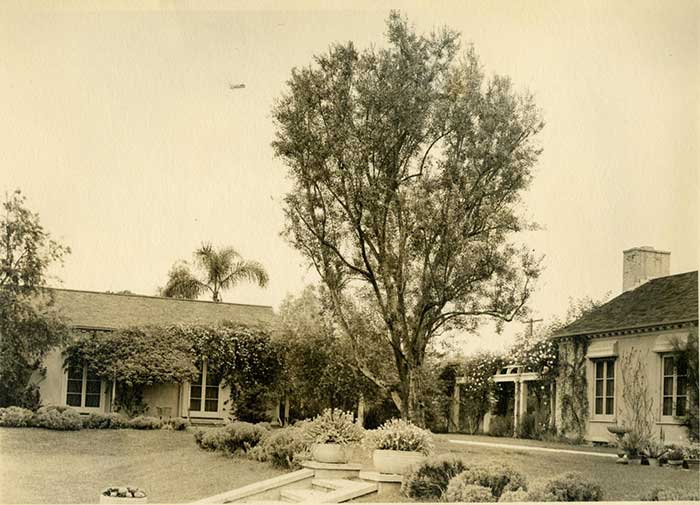 South facing exterior and “office” of the director’s house. Beatrix Farrand designed the paths and plantings around the office in the 1930s, using mostly hedges and flowers. Her original plans called for calla lilies, narcissus, iris, and freesias. The Huntington Library, Art Collections, and Botanical Gardens.