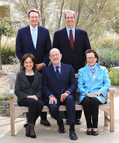 Incoming board chair Anne Rothenberg (front row, right), outgoing chair Stewart Smith (back row, left), and fellow Trustees Geneva Thornton, Loren Rothschild, and Andy Barth. Photo by Danielle Klebanow.