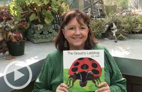 Docent with The Grouchy Ladybug book