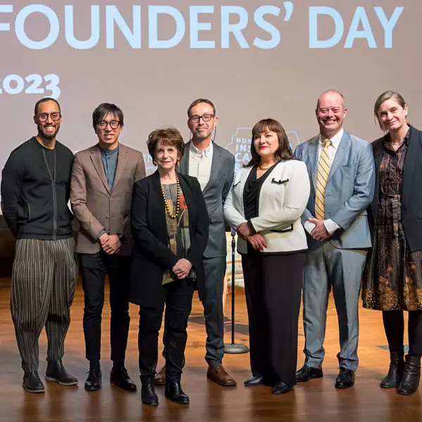 Presenters at the 2023 Founders’ Day stand together on a stage.
