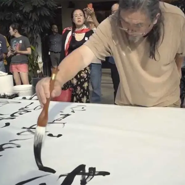 Calligraphy Demonstration  by Tang Qingnian
