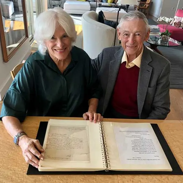 Susan R. and L. Dennis Shapiro with some of their presidential letters and related materials.