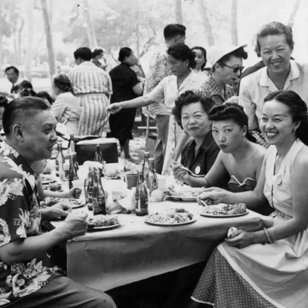 Detail of photograph of Mabel Hong (second from right, standing) at Chinese American Citizens Alliance picnic, 1950s. The Huntington Library, Art Museum, and Botanical Gardens.