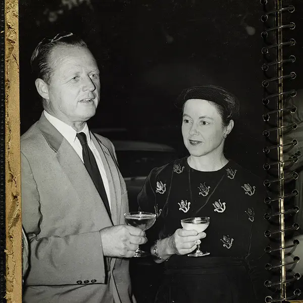 Millard Sheets and his wife, Mary Sheets, at a party in 1954.