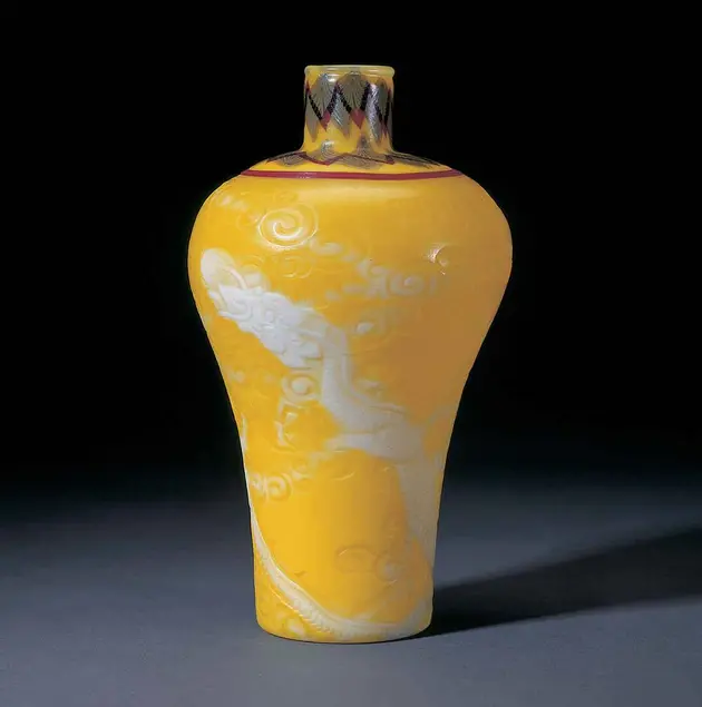 Tiffany Studios, Yellow Cameo Vase, Favrile glass, 8 3/4 × 4 7/8 in. Collection of Stanley and Dolores Sirott, © David Schlegel, courtesy of Paul Doros. Image courtesy of The Huntington Library, Art Collections, and Botanical Gardens.