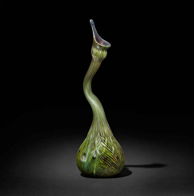 Tiffany Studios, Gooseneck Peacock Vase, Favrile glass, 11 5/8 × 3 5/8 in. Collection of Stanley and Dolores Sirott, © David Schlegel, courtesy of Paul Doros. Image courtesy of The Huntington Library, Art Collections, and Botanical Gardens.