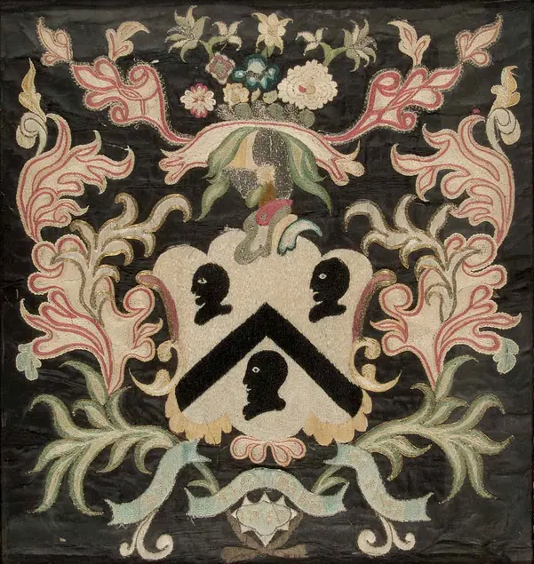Rebecca Ives Gilman (1746–1823), Ives Family Coat of Arms, 1763. Silk, gold and silver thread on black silk, 17 × 16  in. Huntington Library, Art Collections, and Botanical Gardens, promised gift of Thomas H. Oxford and Victor Gail.