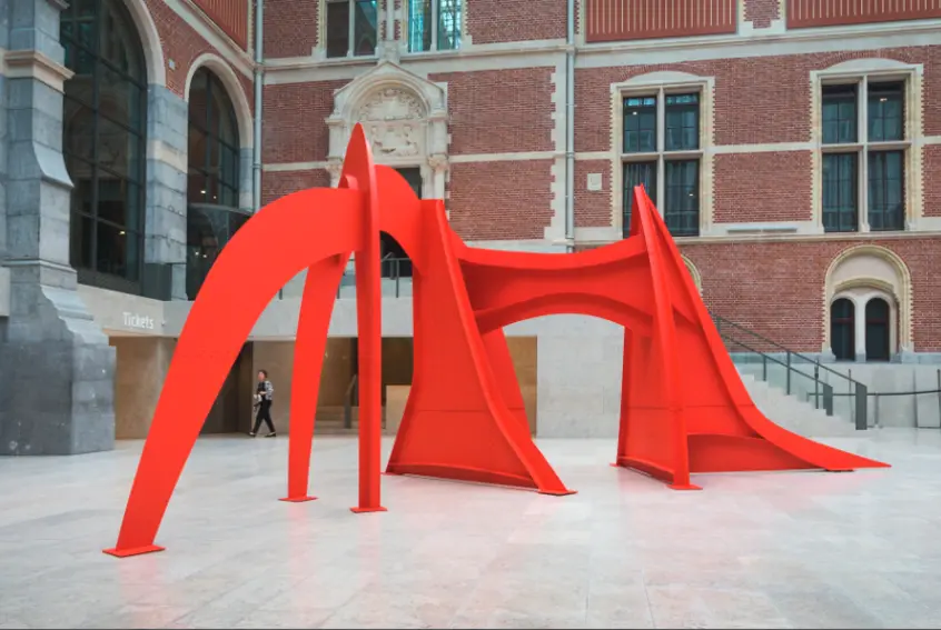 Alexander Calder, Jerusalem Stabile, 1976, sheet metal, bolts, and paint, 141 × 288 × 143 in., at the Rijksmuseum, Amsterdam, in 2014. Calder Foundation, New York; gift of the Philip and Muriel Berman Foundation to the Calder Foundation, 2005. Copyright © 2015 Calder Foundation, New York / Artists Rights Society (ARS), New York.