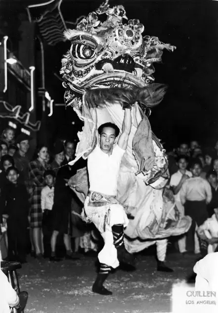 Lion dance for Chinese New Year in New Chinatown Central Plaza, 1940s. Los Angeles Public Library, Harry Quillen Photo Collection.