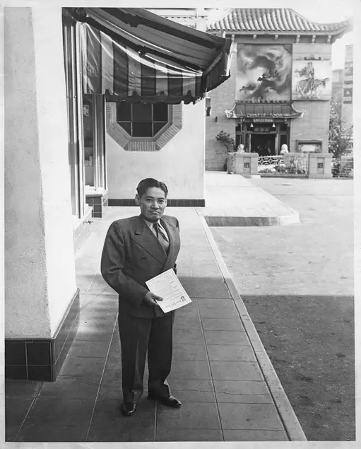 Y. C. Hong outside his immigration law office in the Central Plaza, 1940s. The Huntington Library, Art Museum, and Botanical Gardens.