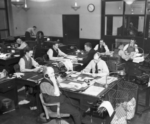 Reporters in the newsroom in 1941