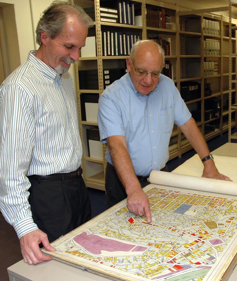 Alan Jutzi and David Mihaly look at one of the L.A. city maps Alan Jutzi and David Mihaly look at one of the L.A. city maps