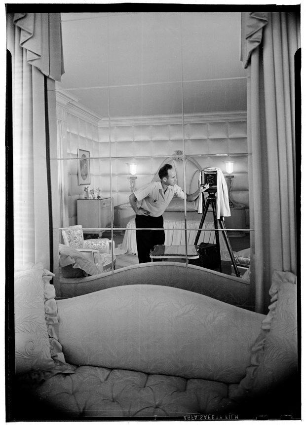 Maynard Parker at work in the bedroom of Hilda Boldt Weber residence Maynard Parker at work in the bedroom of Hilda Boldt Weber residence