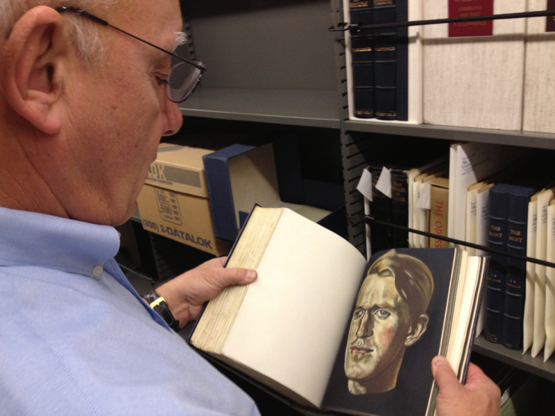 Curator Alan Jutzi holds The Huntington's copy of the 1926 edition of<br />
 Seven Pillars of Wisdom