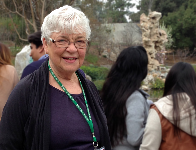 With docent Sandra Mader as their guide, students use poetry to capture the beauty of the Chinese Garden. Photo by Bonnie Taylor.