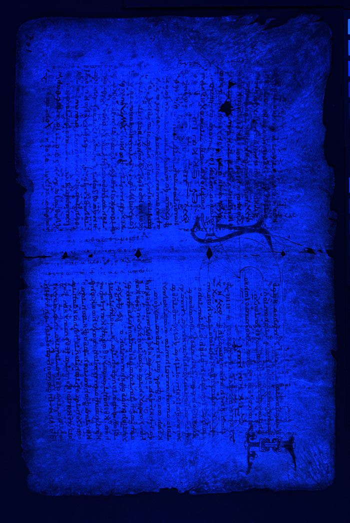 Turned 90 degrees and under ultraviolet light, the Archimedes Palimpsest reveals spiral lines of Archimedes’ original text (leaves 98v–102r). Copyright the owner of the Archimedes Palimpsest, licensed for use under Creative Commons Attribution 3.0 Unported Access Rights.