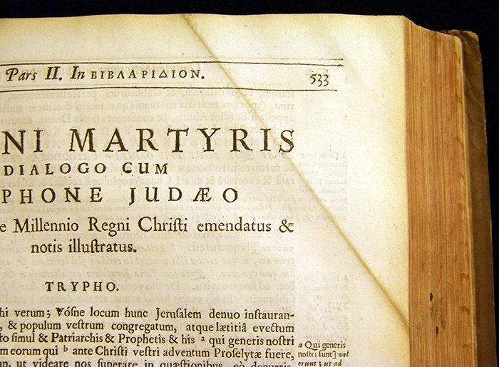 The outside fold of a dog-ear marking Justin Martyr’s testimonies about the Millennium in Newton’s copy of Mede’s Works (1672). The accumulated dirt on the fold is evidence that Newton kept the dog-ear down for many years. The Huntington Library, Art Collections, and Botanical Gardens.