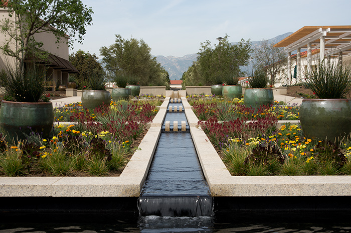 The San Gabriel Mountains form a backdrop to the Celebration Garden, with the new Mapel Orientation Gallery on the left and new café on the right.