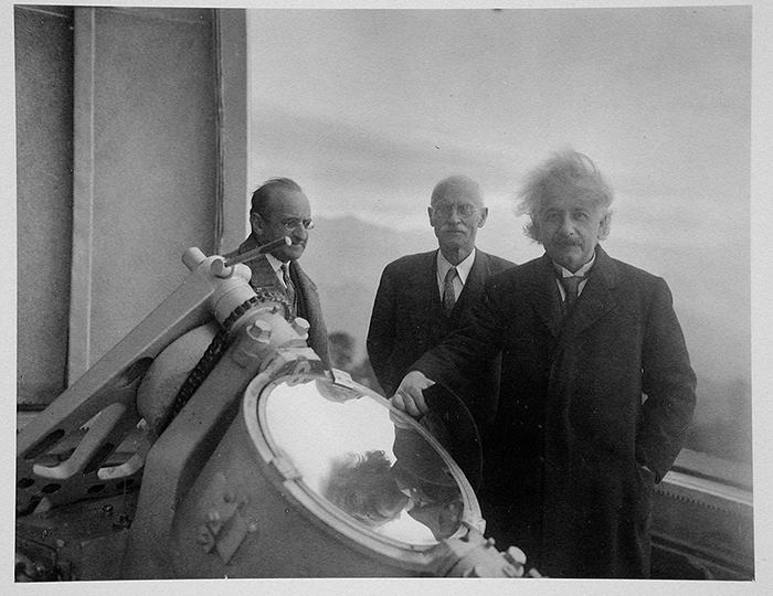 Albert Einstein (right) at the top of the 150-foot solar tower at the Mount Wilson Observatory, with solar physicist Charles St. John (middle) and mathematician Walther Mayer (left). Jan. 29, 1931. The Huntington Library, Art Collections, and Botanical Gardens.