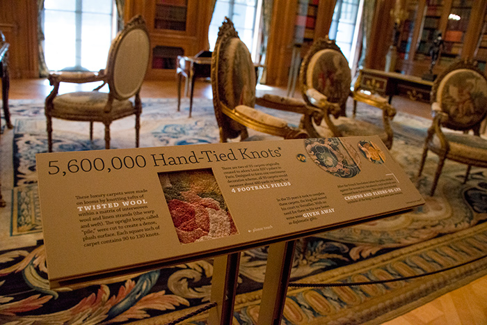In the past, sumptuous furnishings may have tempted visitors to touch. Now, thanks to interactive displays—such as this one on the Savonnerie carpets—visitors can.