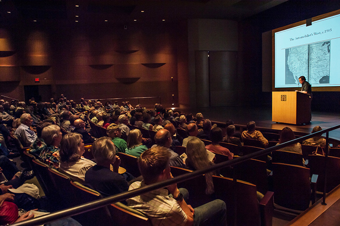 Peter J. Blodgett, The Huntington’s H. Russell Smith Foundation Curator of Western American Manuscripts and editor of Motoring West, lecturing on Aug. 8 in The Huntington’s Rothenberg Hall. Photo by Martha Benedict.