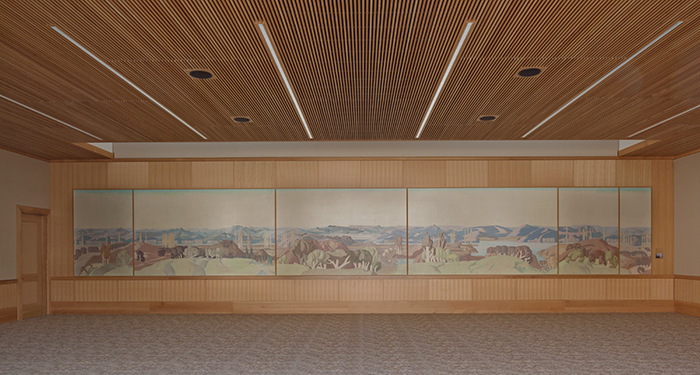 Mural for the Home of Fred H. and Bessie Ranke, 1934, by Millard Sheets. Gift of Larry McFarland and M. Todd Williamson. Depicting a bucolic California landscape of stylized hills and trees, the mural was painstakingly removed and conserved before being installed in the Stewart R. Smith Board Room at The Huntington. Photo by Tim Street-Porter. The Huntington Library, Art Collections, and Botanical Gardens.