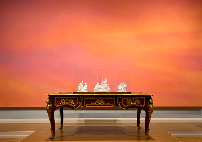 Alex Israel’s Sky Backdrop is the new setting for three Sèvres biscuit porcelain figures atop an 18th-century French table. Photo by Kate Lain.