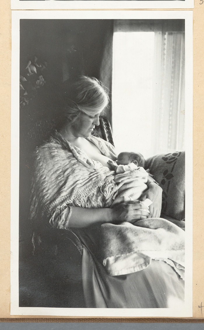 Ralph Arnold snapped this photo of his wife, Winninette Arnold, nursing their infant daughter, Winninette Jr., in their home in South Pasadena, Calif., in 1918. The Huntington Library, Art Collections, and Botanical Gardens.