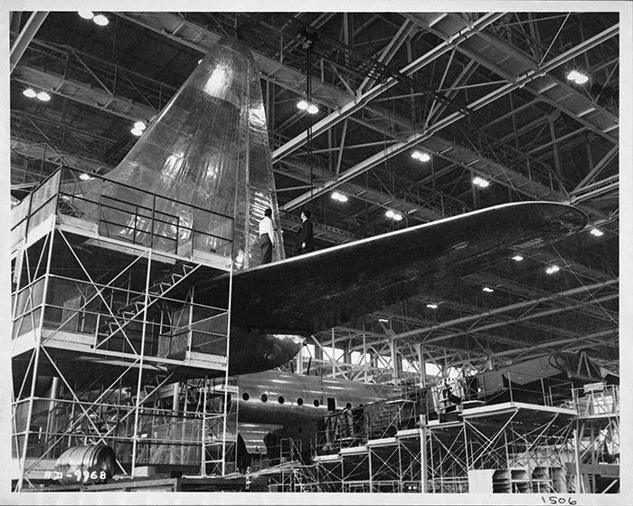 Lockheed R6V Constitution Aircraft under construction. Harvey Christen Collection, The Huntington Library, Art Collections, and Botanical Gardens. Harvey Christen (1910–1993), a mechanic, was one of the first employees of Lockheed Aircraft Corporation.